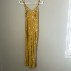 Long pant romper, mustard colored.